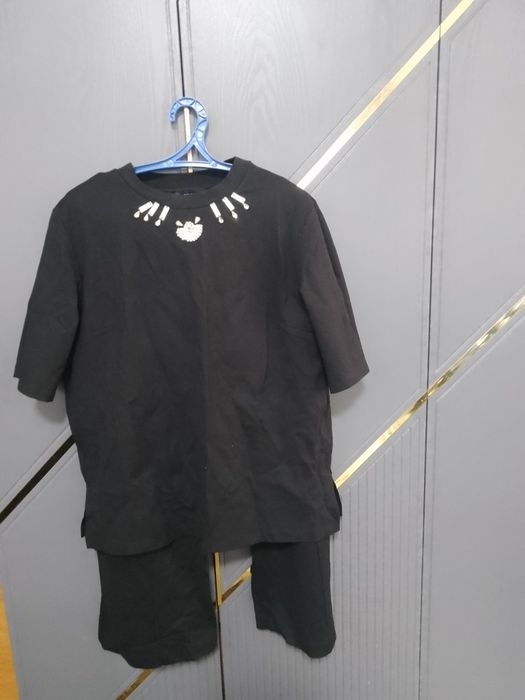 Продам брючный костюм 48-52