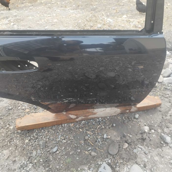 Jentra eshigi pasajir orqasi