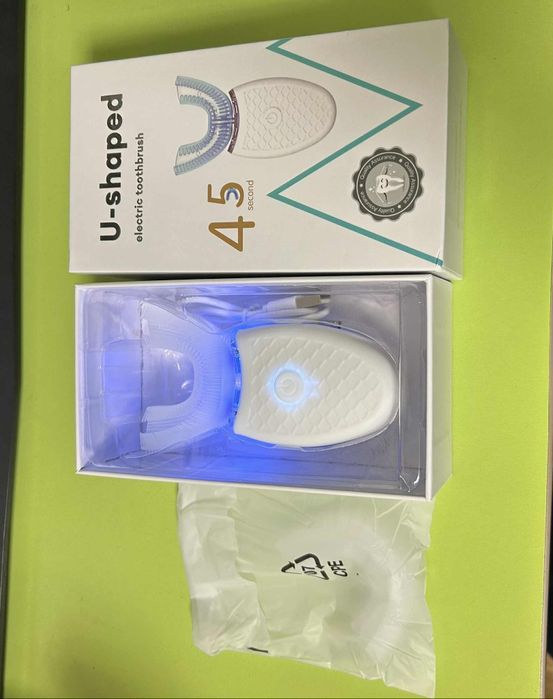 Електрическа у-образна четка за зъби