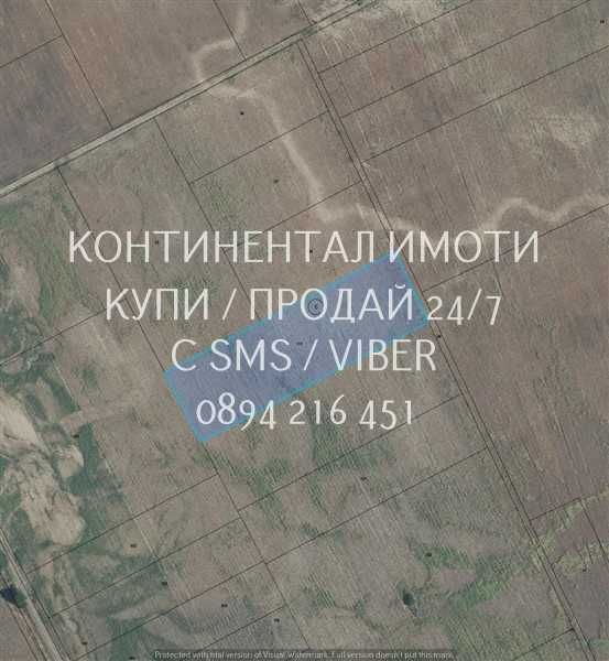 код 63027. Нива 8000м2 на около 500м от АМ Тракия.
