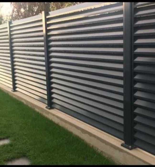 Executam garduri si porti