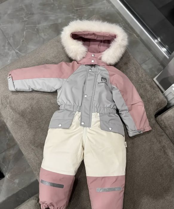 Продам новый зимний комбинезон рост 110см