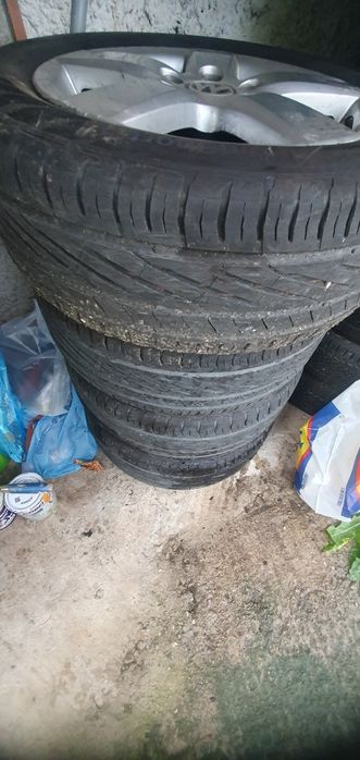 Jante aliaj VW  5x112, 16 inch, anvelope vara Uniroyal DOT 2