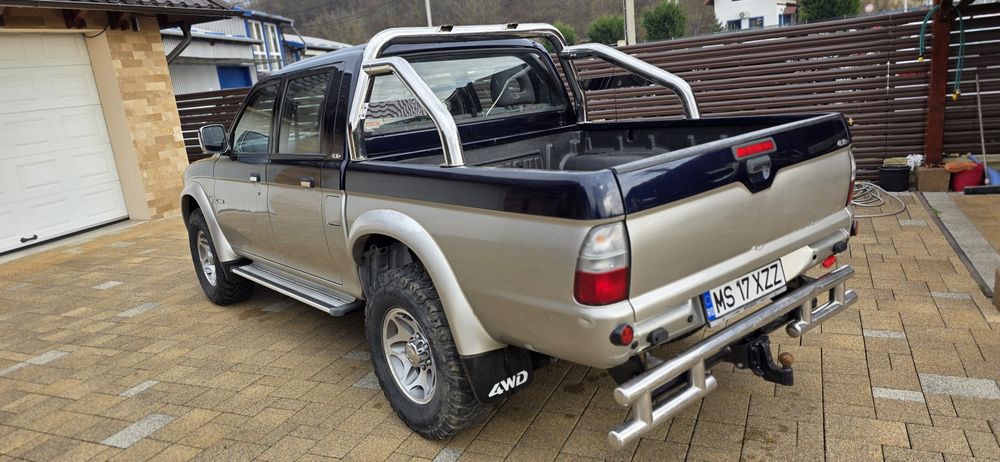 Mitsubishi L200 din 2005 volan pe dreapta 116 cp