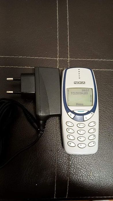 Încărcător Samsung cu cablu     Nokia.3330