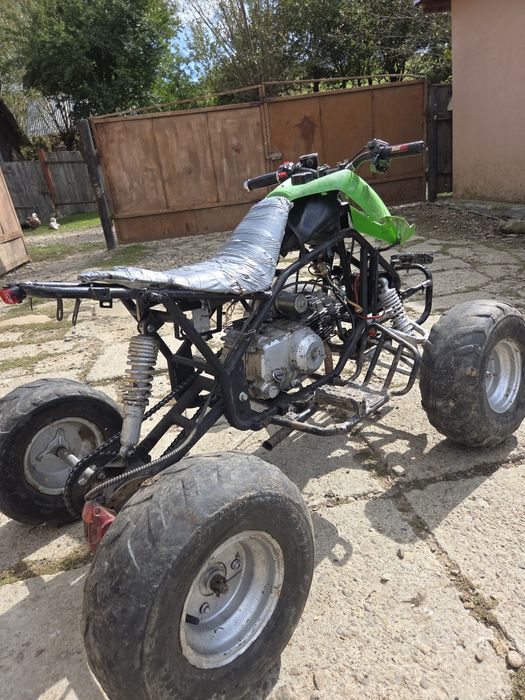 Vand atv 125cc merge impecabil