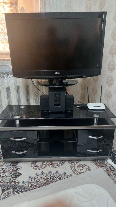 Телевизор подставкаси билан