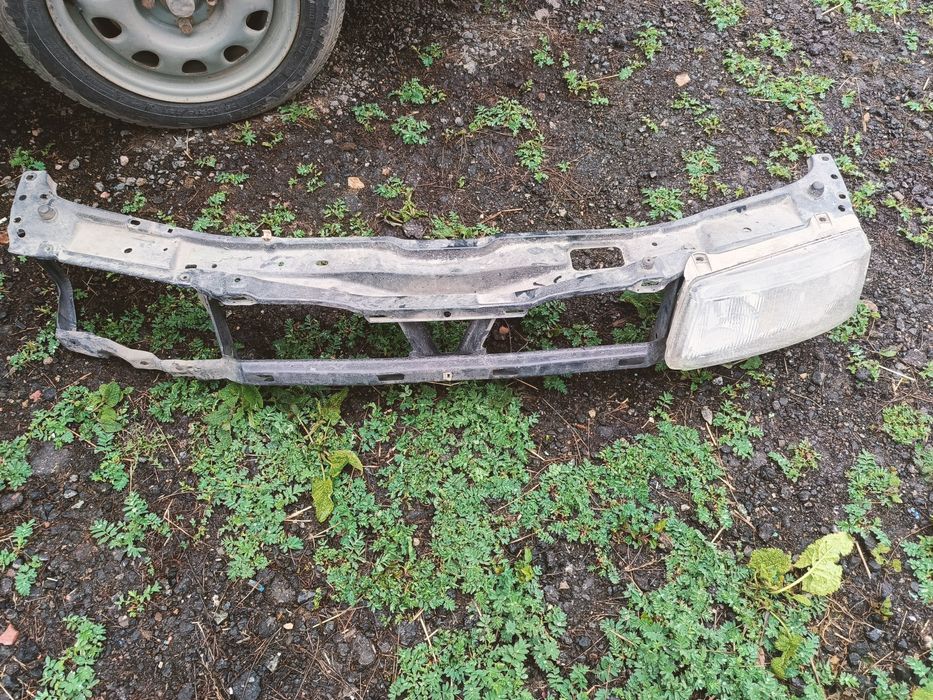 Фара левая с решеткой пассат б4