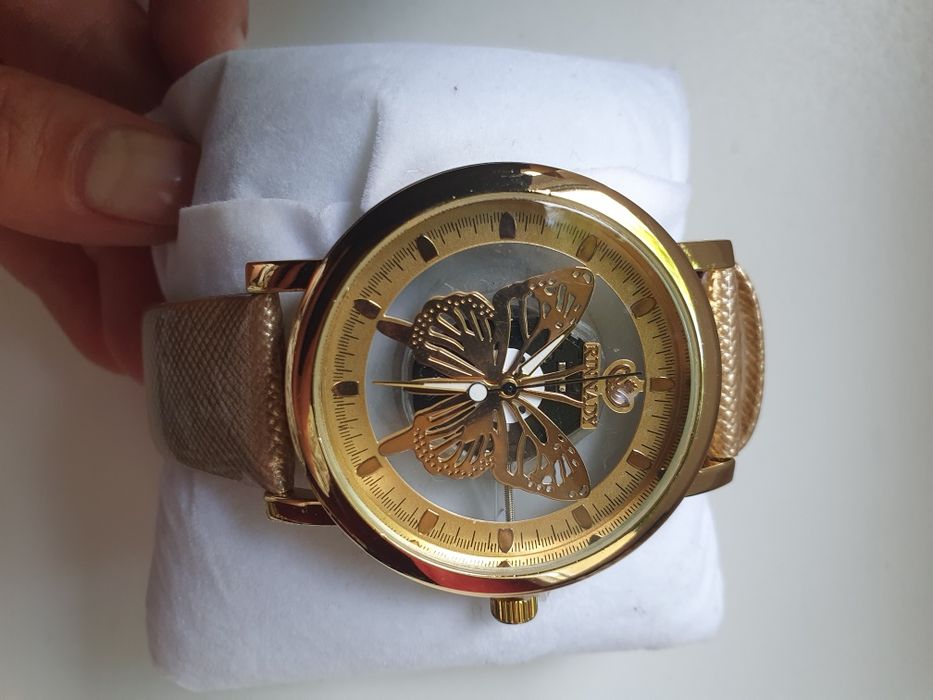 Ceas tip Skeleton si fluture, noi