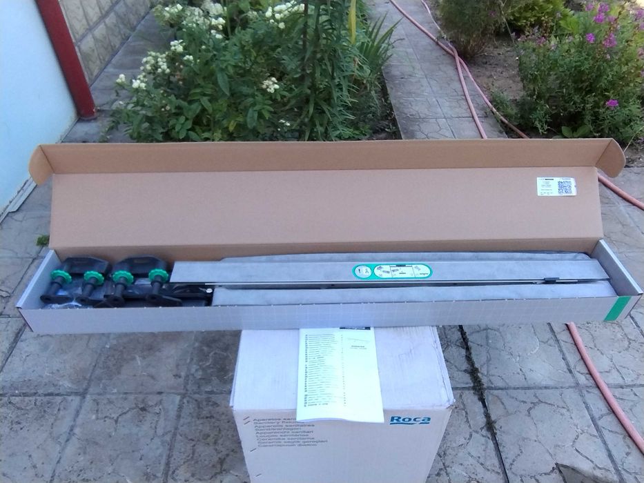 NOU: Hansgrohe RainDrain Rigola de pardoseala + Capac faiantabil 90 cm