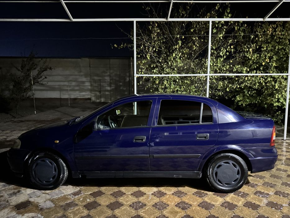 Opel astra g  sotiladi idealni turupti metan gazda yuradi