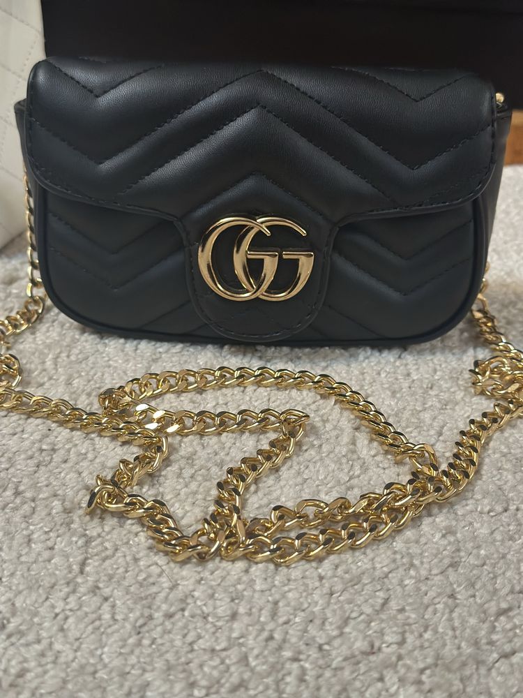 Чанта Gucci.