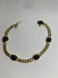 Bratara aur 18kt.cu safire