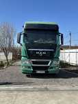 Ansamblu Man TGX Euro 5 EEV si semiremorca cereale SCHMITZ