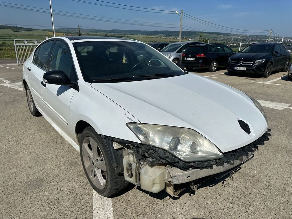 Dezmembrez / Dezmembrari / Piese / Accesorii Renault Laguna 3 alba 2.0 tdi m9r 2009 volan stanga