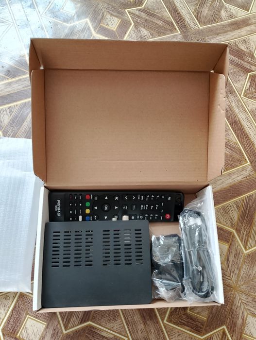 Vând receptor pentru cablu Amiko,decodează toată grila Digi cablu