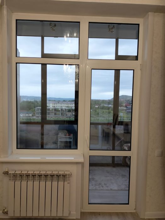 Пластиковое окно с балконам