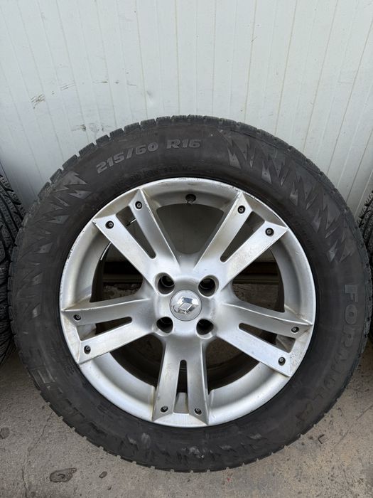 Vand set jante aliaj dacia 4x100 r 16 plus cauciucuri de iarna