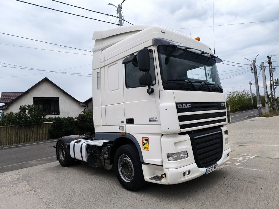 Ansamblu DAF XF 105 cutie automata an fabricație 2012 semiremorca Schm