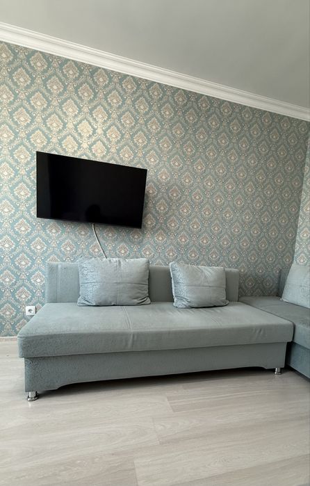 Диван раскладной бирюзового цвета