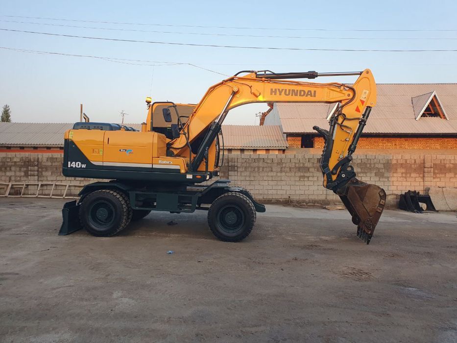 Экскаватор 140 с гидромолотом