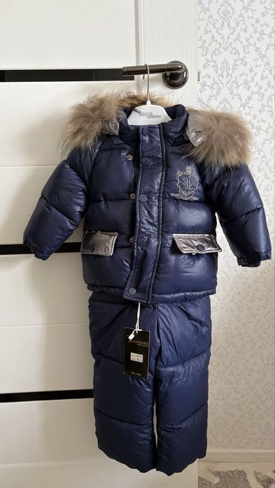 Продам новый детский зимний комбинезон