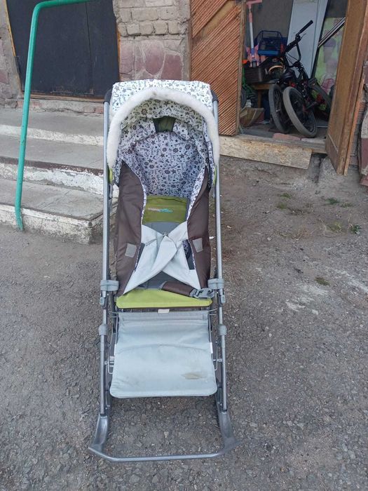 Детская санка с колесами