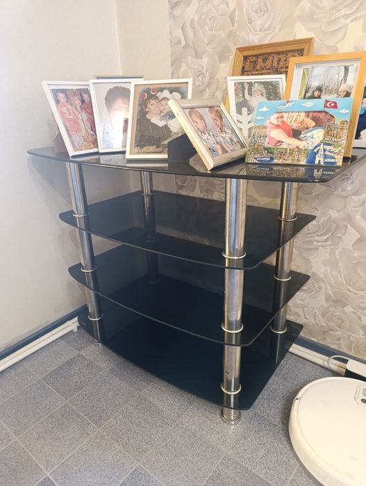 Стол стеклянный , с полками. Можно под телевизор.