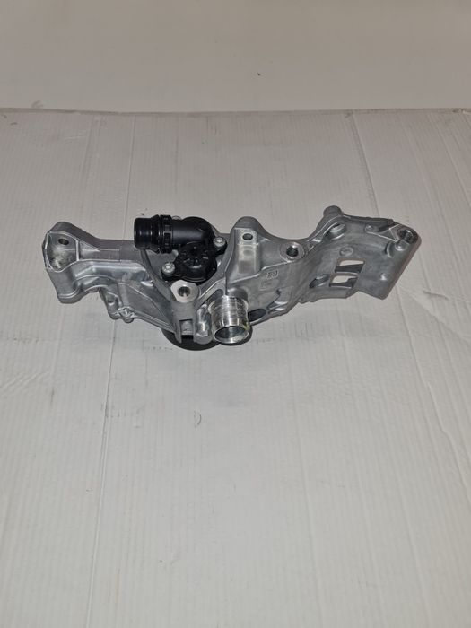Suport accesorii pompa apa 1.5 B38A151 / cod-8631940 / BMW seria 1 /2