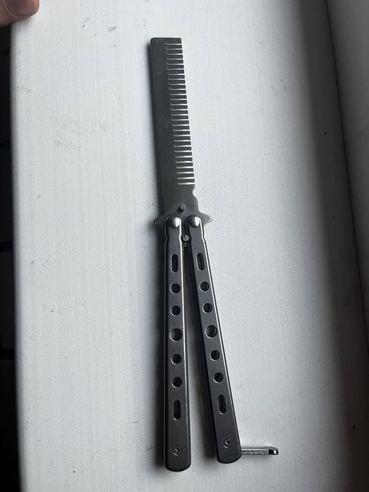 бабочка расческа