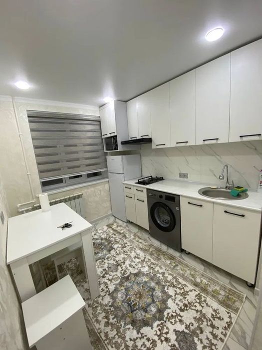 Ялангач 
теннисный корт
Кирпичный дом