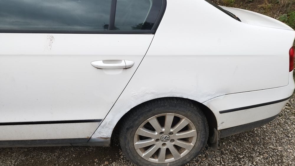 VW Passat cu probleme grave de caroserie