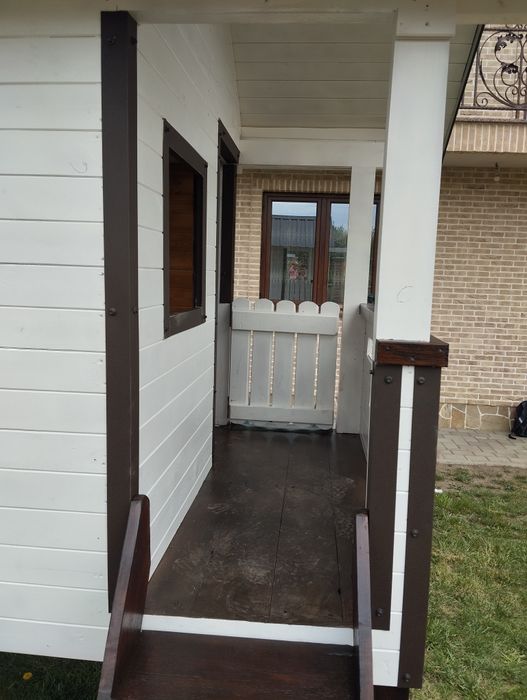 Casuta din lemn pentru copiii ..cu leagan si topogan