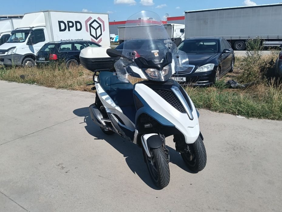 Scuter 3 roti piaggio mp 3 categoria b  2013