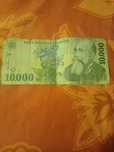 Vând bacnota de zece 1.0000