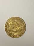 Vand moneda aur 1000 schilingi