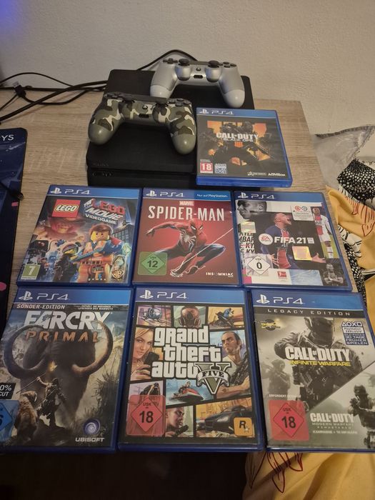 PS4 SLIM cu 2 manete si jocuri