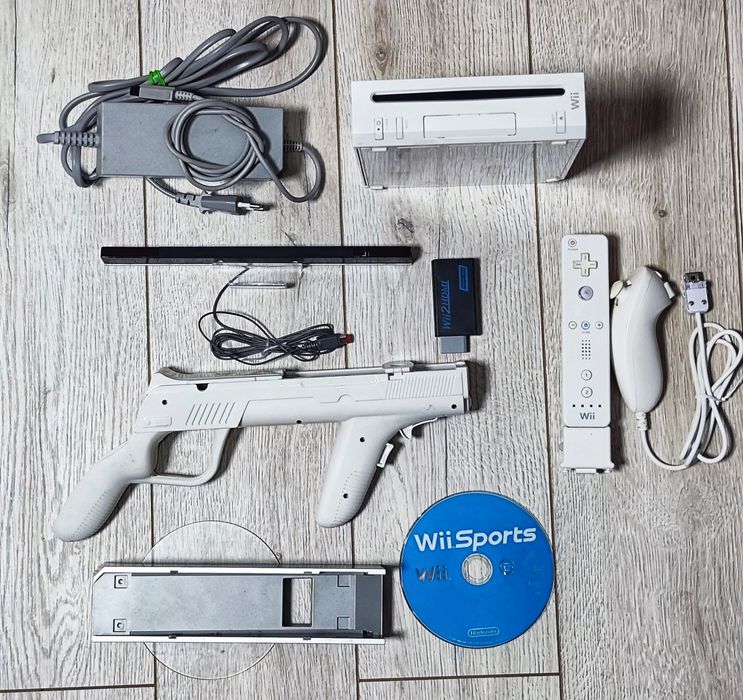 Nintendo Wii + Wii Sports + HDMI + pistol + controller Motion Plus – t