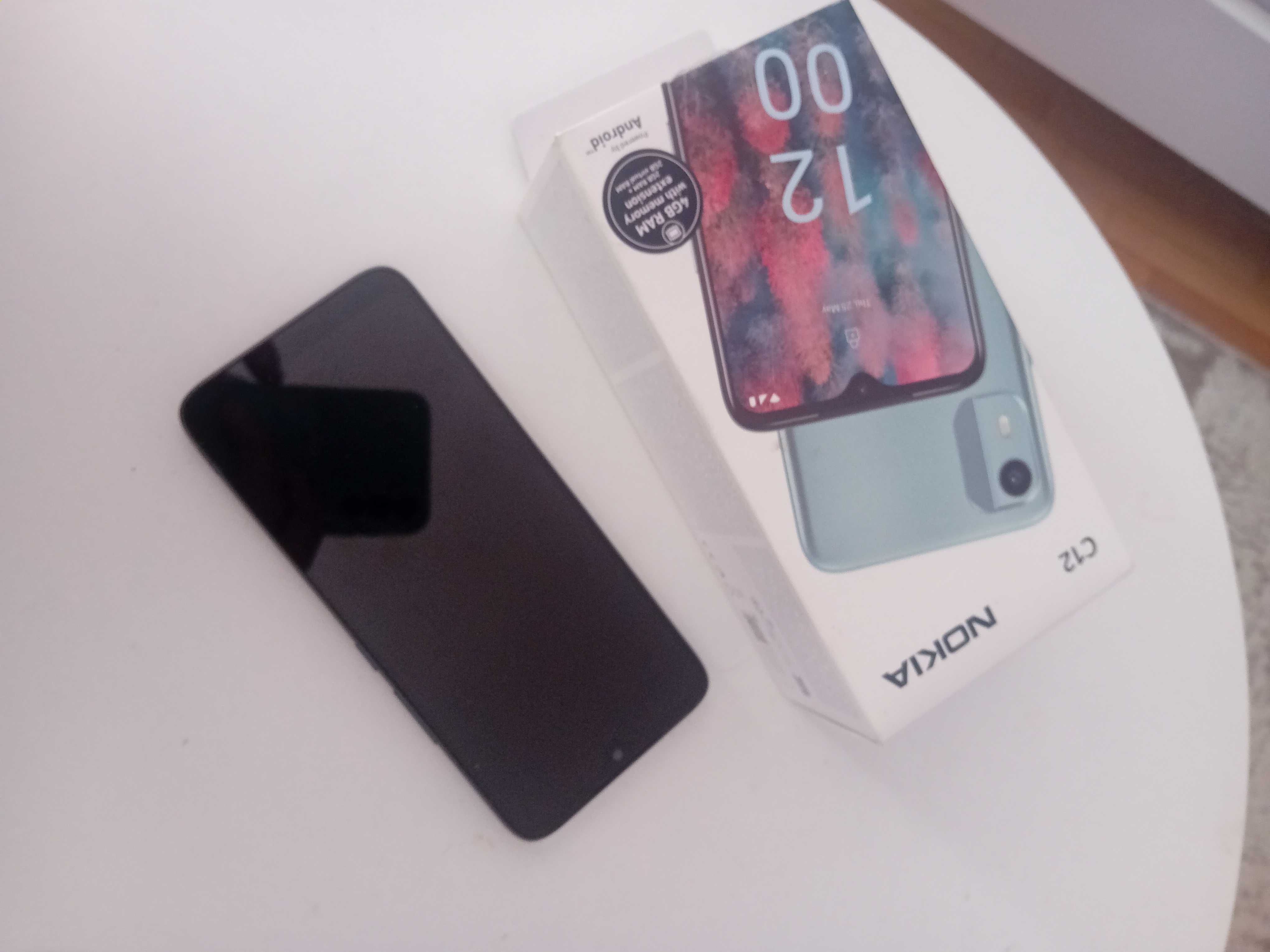 Телефон Nokia  C 12  нов в кутия неизползван.