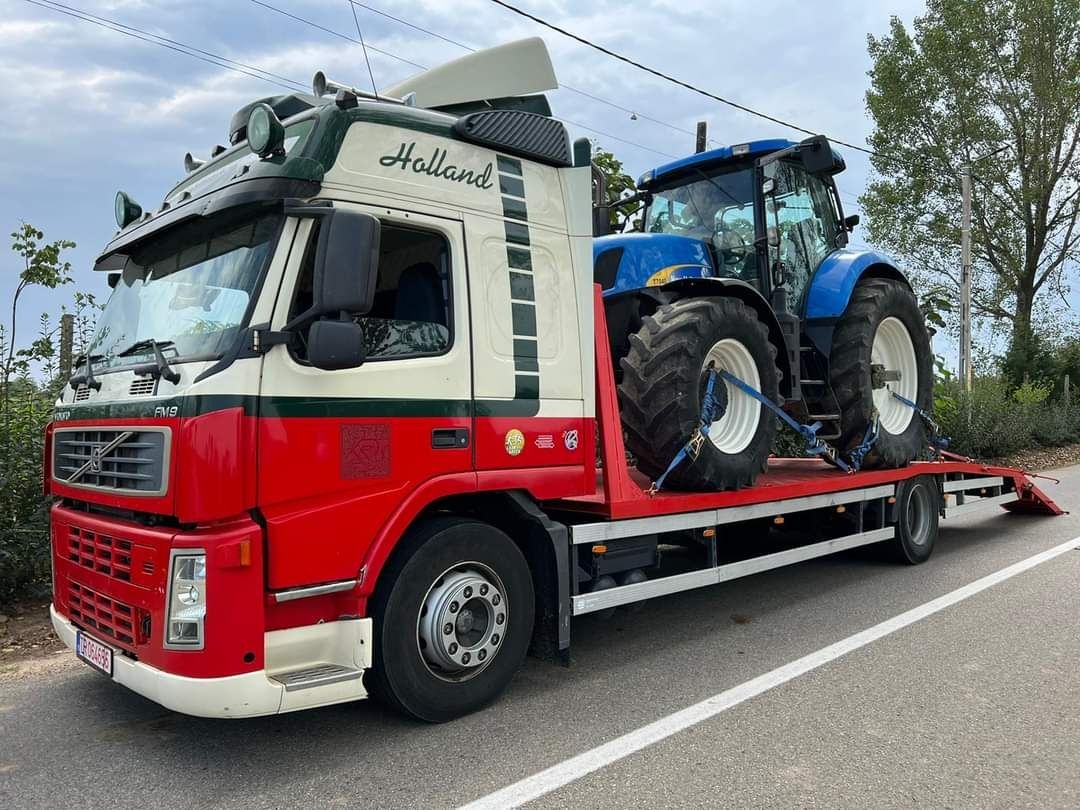 Tractari auto București trailer utilaje dube lungi transport camioane