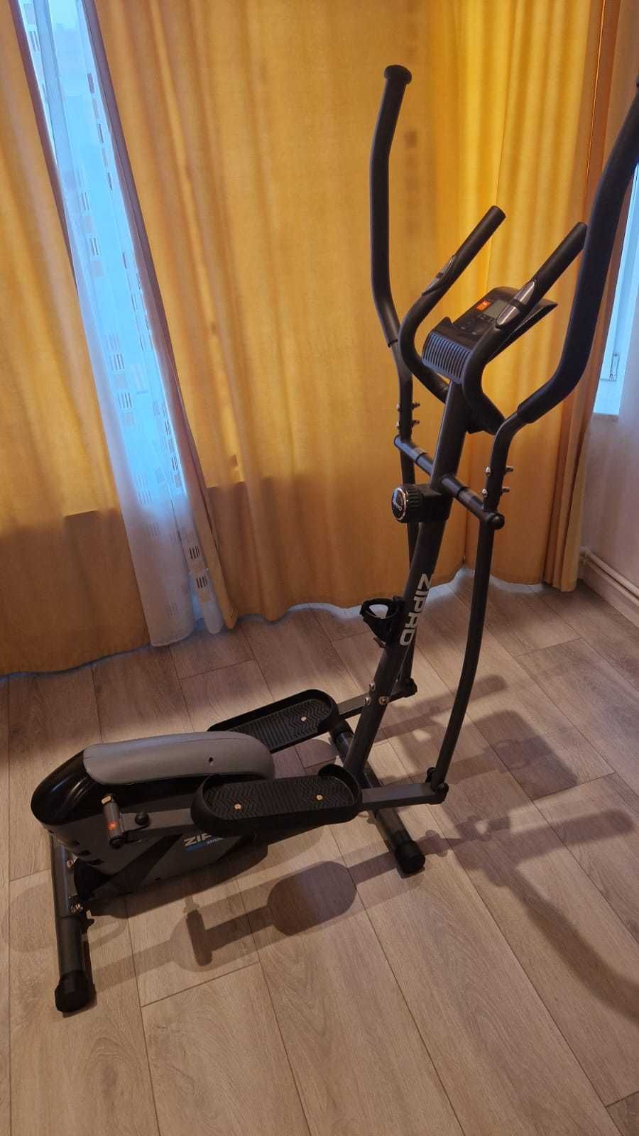 Bicicleta fitness eliptica Zipro Shox volanta 7kg greutate max 120kg