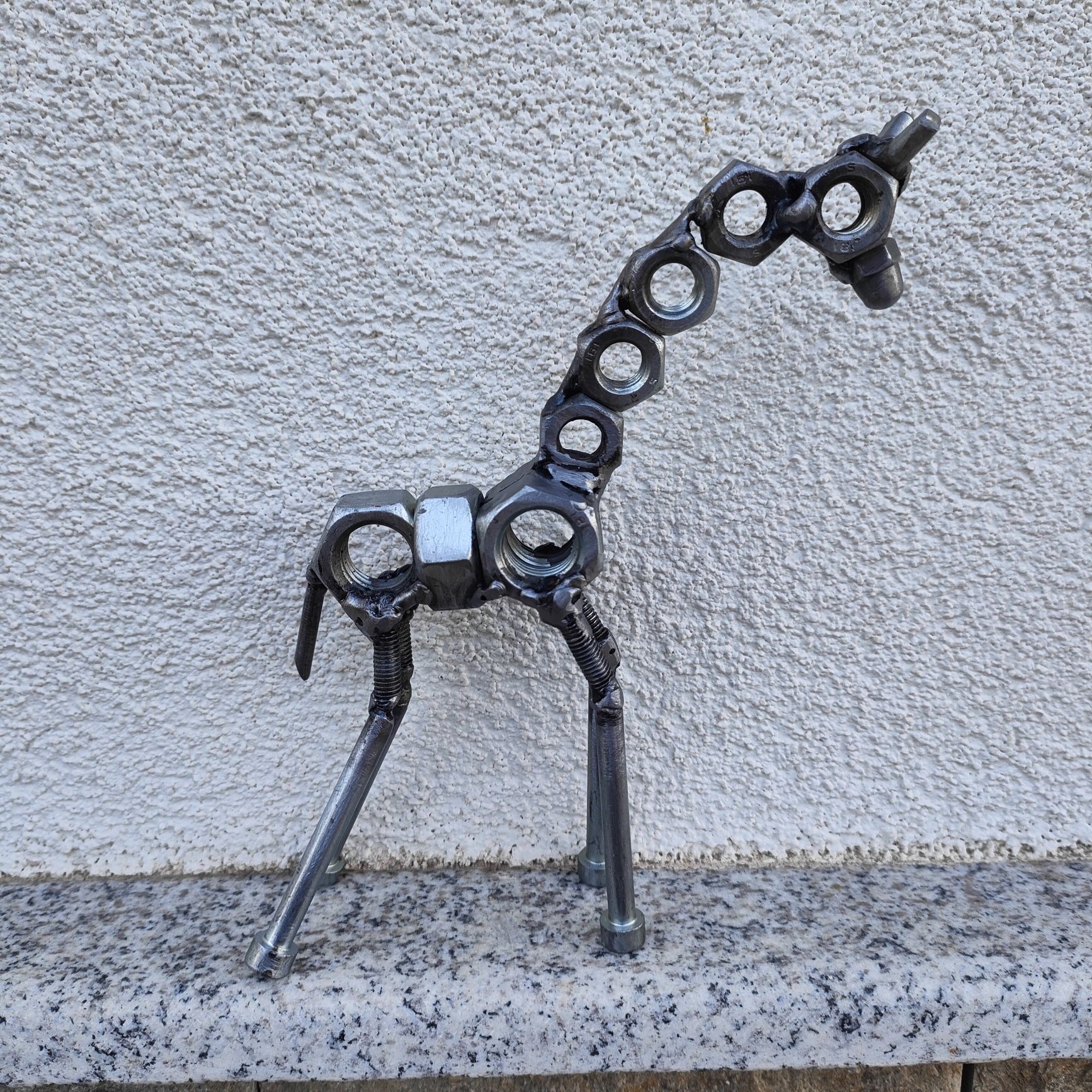 Фигурка на Жираф направен от рециклирани материали
