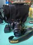 Nikon D3100 cu obiectiv 18-55 si 18600 poze facute.