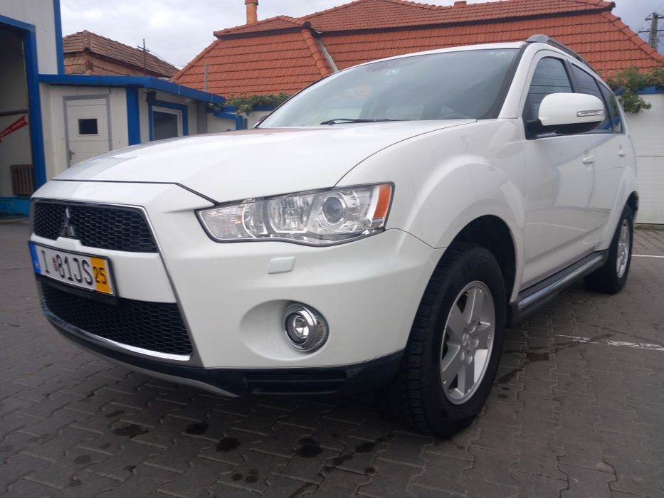 Mitsubishi Outlander an 2012 . Euro5.  7LOCURI.