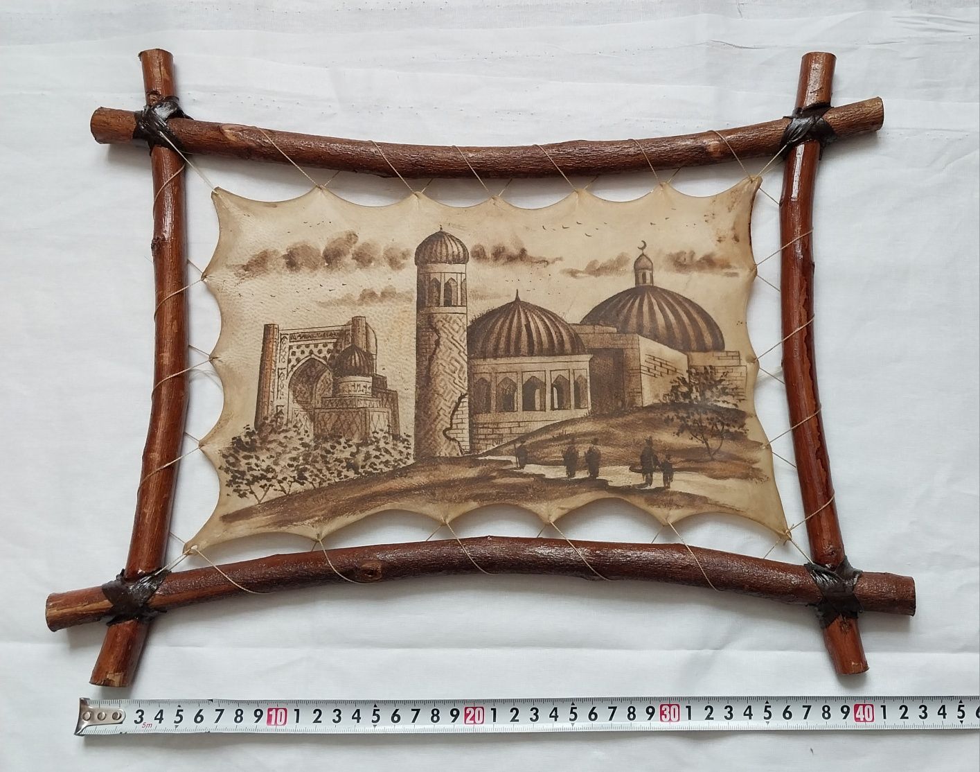 Картины на коже.Целые.Висели на стене.