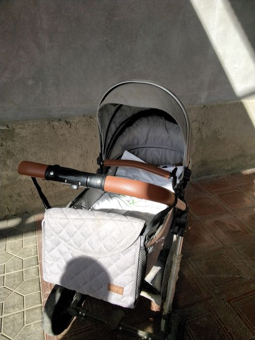 Каляска детская для детей с сумкой