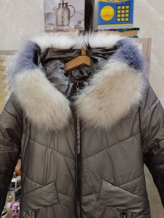 Женский пуховик.