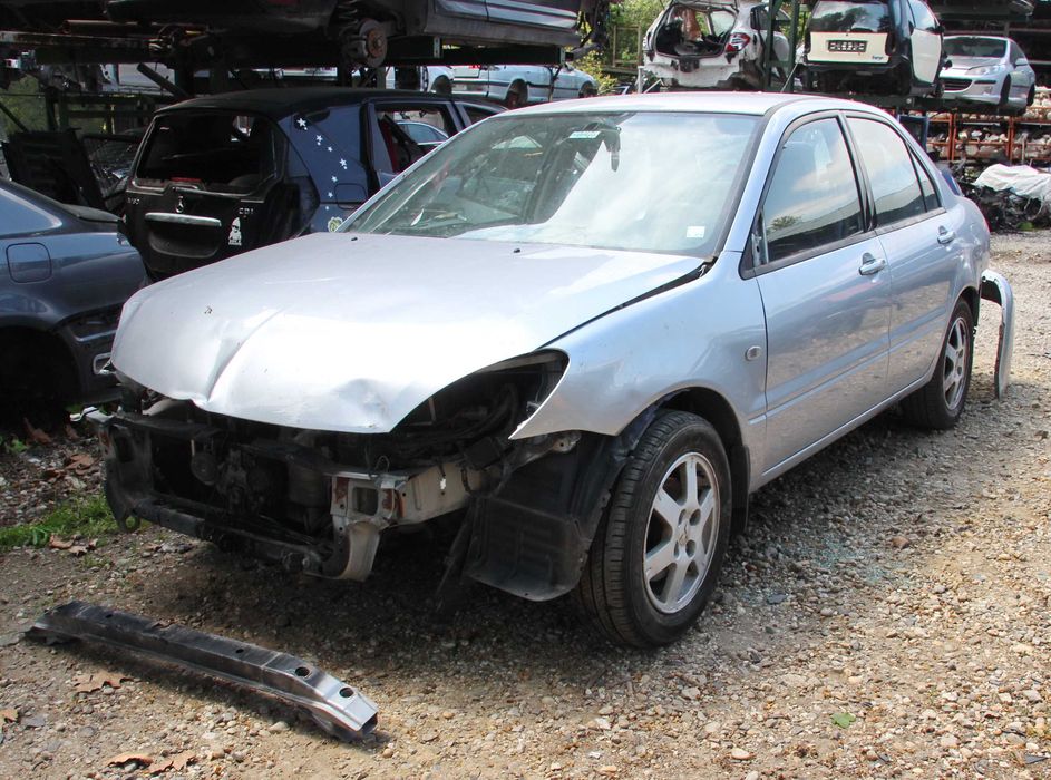 Mitsubishi  Lancer	1.6i – само за части