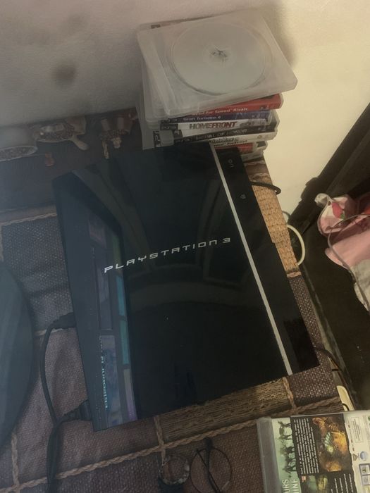 Ps3 cu 13 jocuri plus maneta