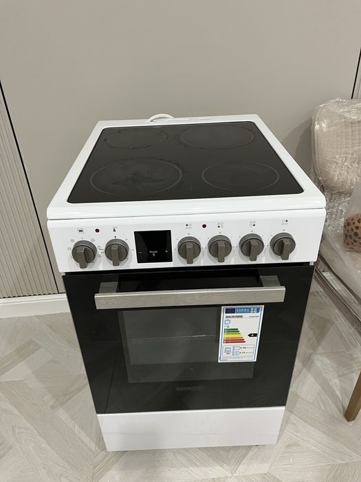 Электричес плита и духовка почти новый